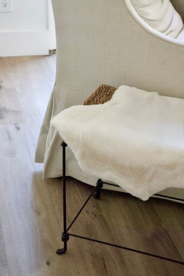 Aged Iron Stool with Sheepskin