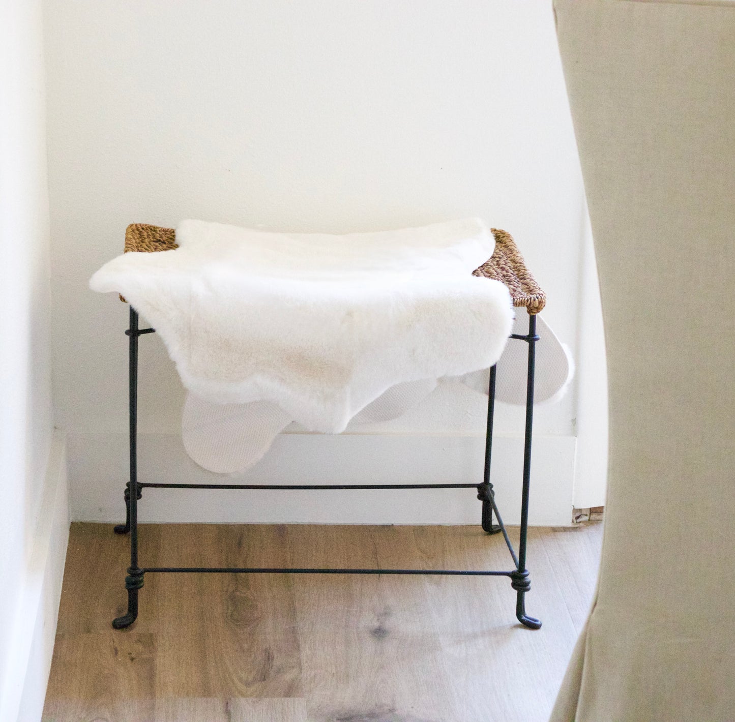 Aged Iron Stool with Sheepskin